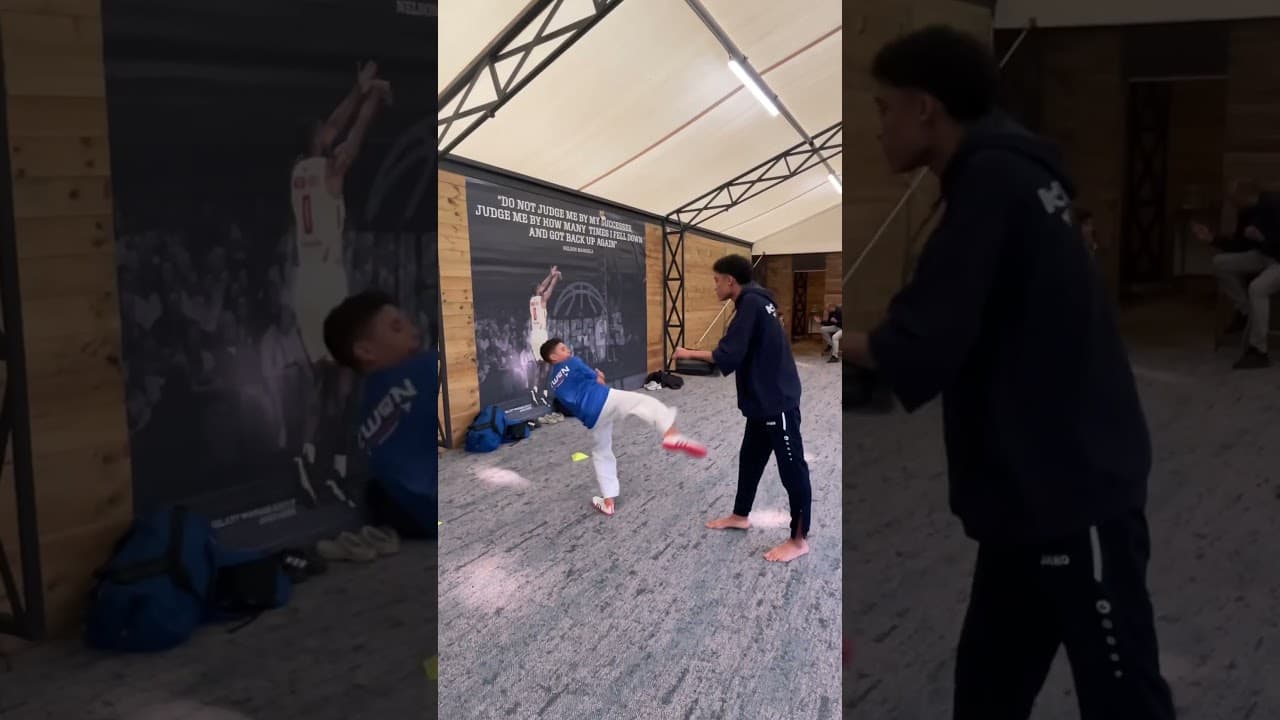 Vertical Jump in Taekwondo Stance with Front Kick Finish